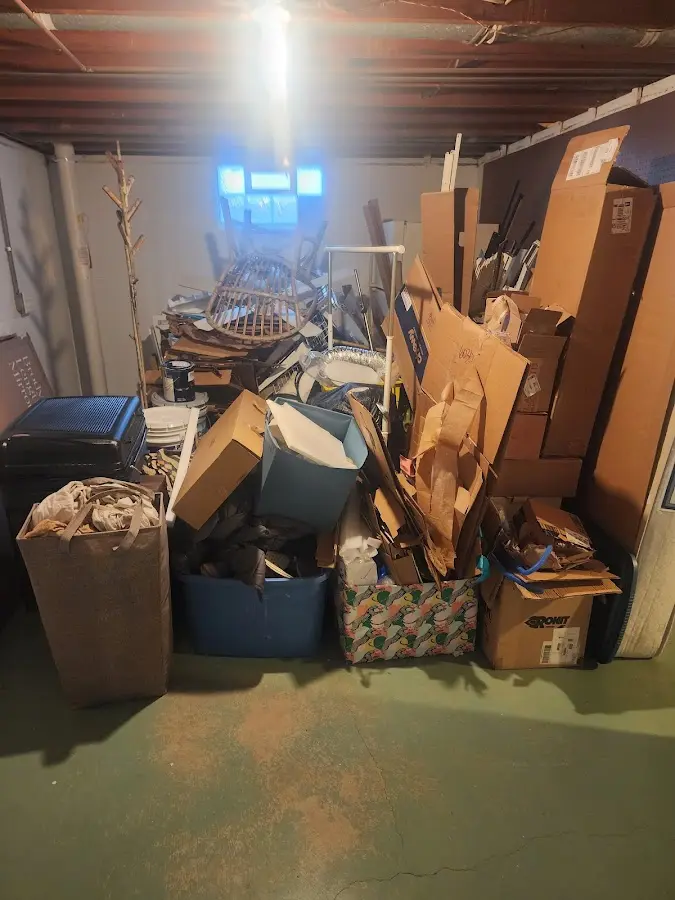 Roll-off dumpster container at job site for 15 Yard Dumpster Rental in Ocean Springs